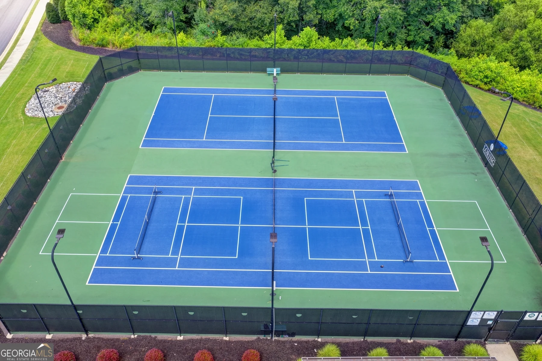 Shared community tennis and pickleball courts